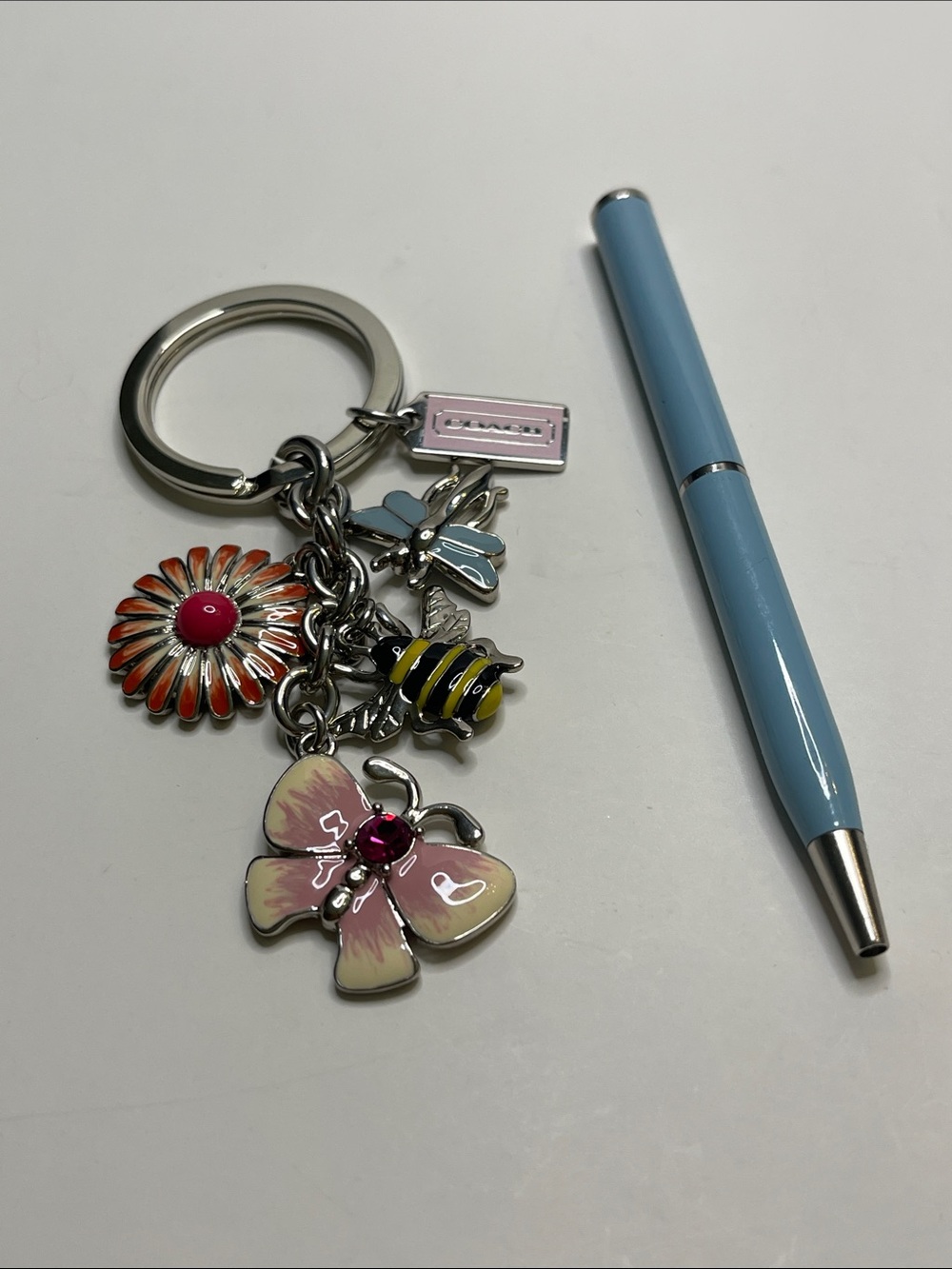 Coach Charm Keychain with Floral, Bee & Butterfly Charms and Coach Pen